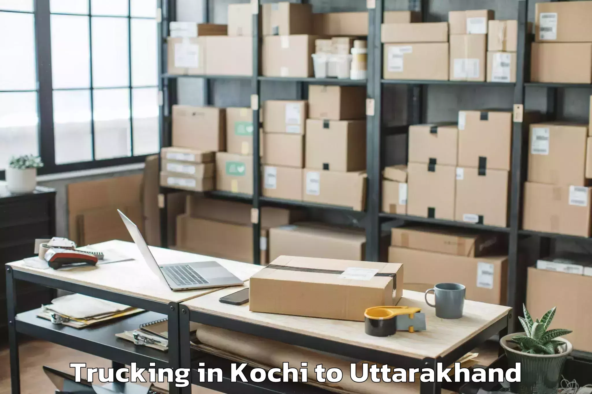 Book Kochi to Uttarakhand Aawasiya Vishwavid Trucking Online